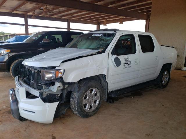 Photo 2 from auction – 2006 HONDA RIDGELINE with VIN 2HJYK16586H553095