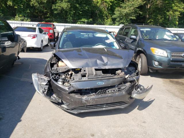 Photo 9 from auction – 2015 FORD FOCUS SE with VIN 1FADP3K21FL295054