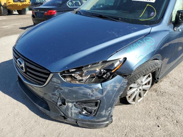 Photo 9 from auction – 2016 MAZDA CX-5 TOURI with VIN JM3KE2CY8G0889140