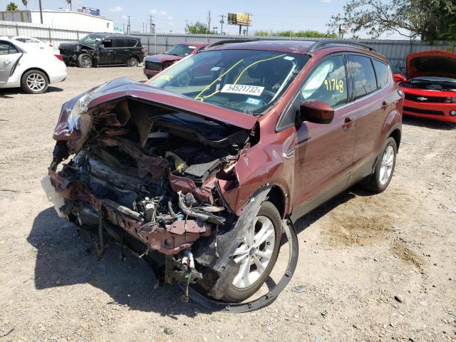 Photo 2 from auction – 2018 FORD ESCAPE SE with VIN 1FMCU0GD8JUA75710