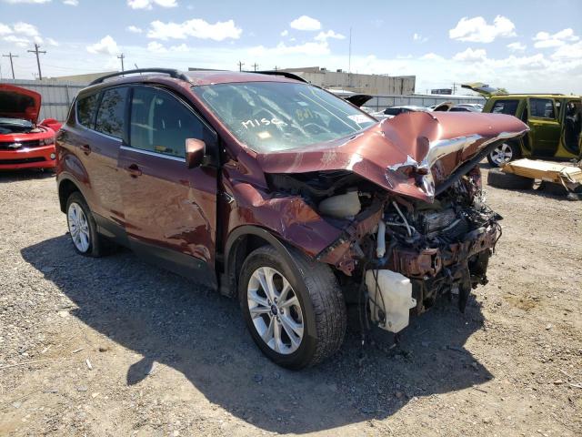 FORD ESCAPE SE 2018 with VIN 1FMCU0GD8JUA75710 - Photo from auction
