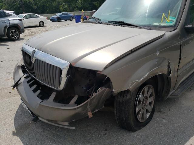 Photo 9 from auction – 2004 LINCOLN NAVIGATOR with VIN 5LMFU27RX4LJ06144