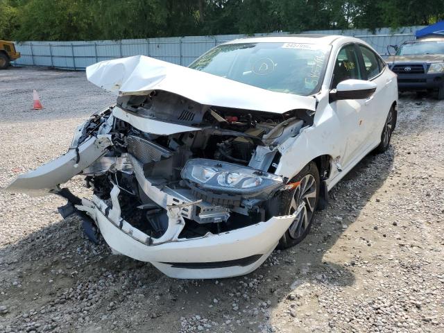 Photo 2 from auction – 2018 HONDA CIVIC EX with VIN 19XFC2F77JE035533