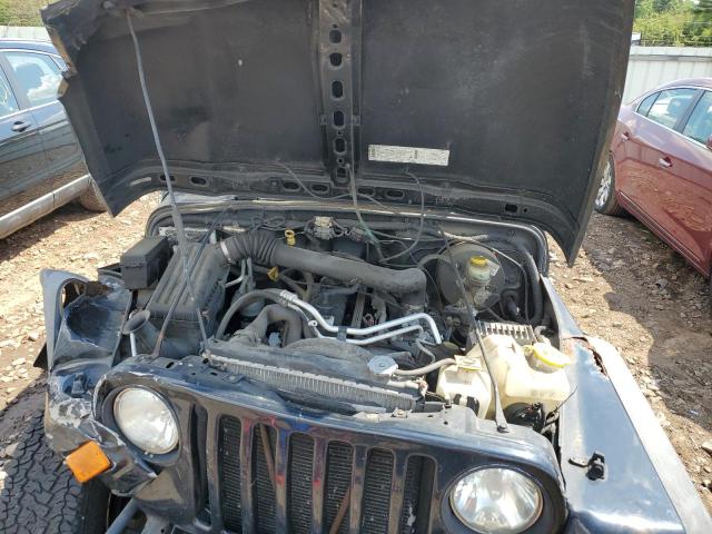 Photo 7 from auction – 2004 JEEP WRANGLER R with VIN 1J4FA39S24P703135