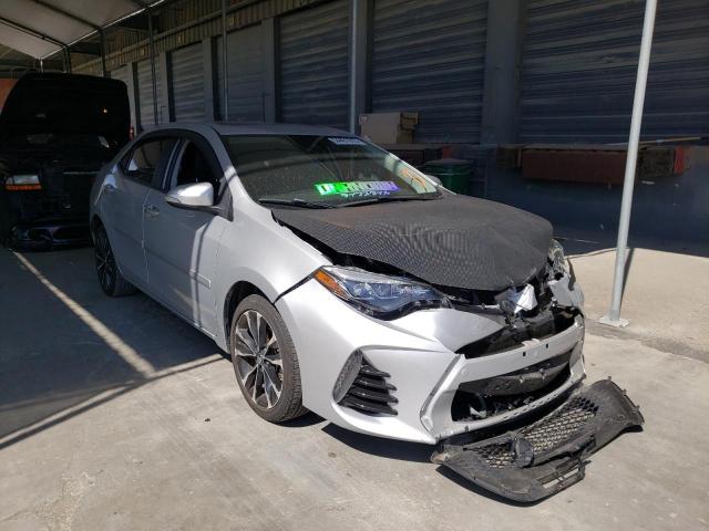 TOYOTA COROLLA L 2018 with VIN 2T1BURHE4JC008028 - Photo from auction