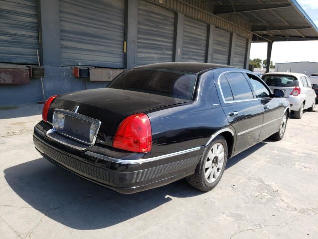 Photo 4 from auction – 2003 LINCOLN TOWN CAR E with VIN 1LNHM84W33Y664024