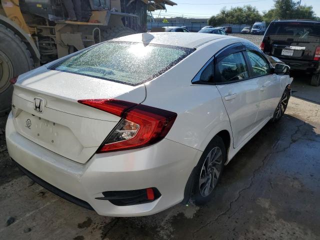 Photo 4 from auction – 2017 HONDA CIVIC EX with VIN 2HGFC2F74HH573591
