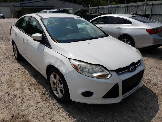 FORD FOCUS SE 2013 with VIN 1FADP3F21DL261719 - Photo from auction