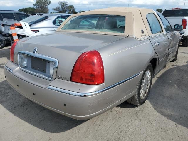 Photo 4 from auction – 2003 LINCOLN TOWN CAR E with VIN 1LNHM81W73Y704626