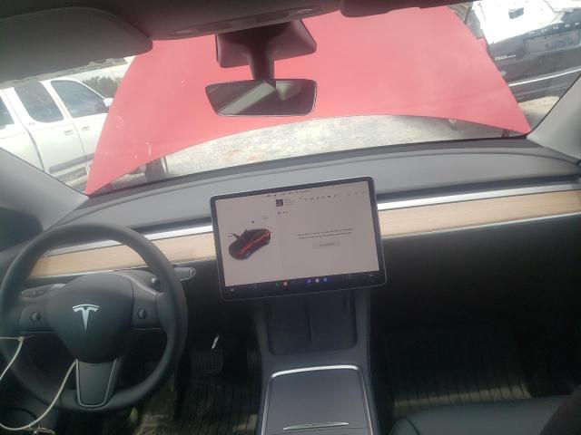 Photo 9 from auction – 2022 TESLA MODEL Y with VIN 7SAYGDEE9NF329060