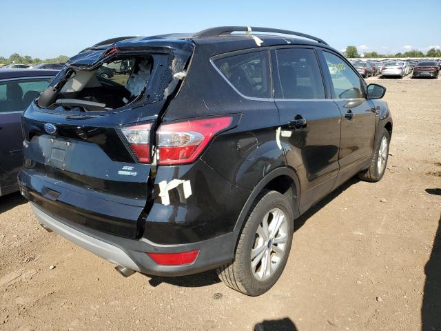 Photo 4 from auction – 2017 FORD ESCAPE SE with VIN 1FMCU9GD8HUE39588