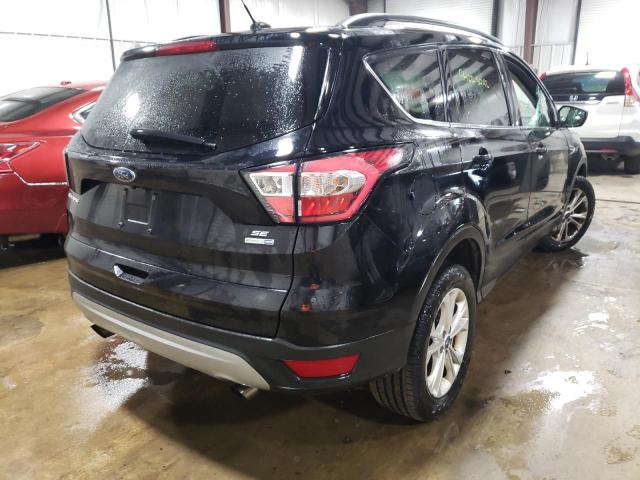 Photo 4 from auction – 2018 FORD ESCAPE SE with VIN 1FMCU9GD4JUB07086