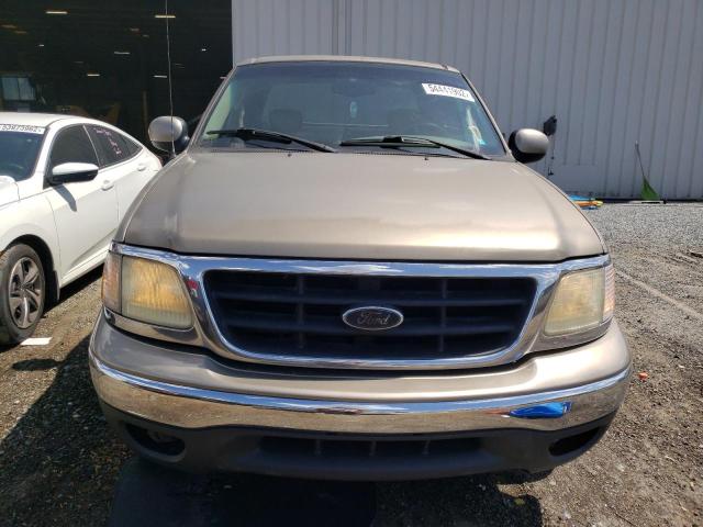 Photo 9 from auction – 2003 FORD F150 with VIN 1FTRX17L03NA30177