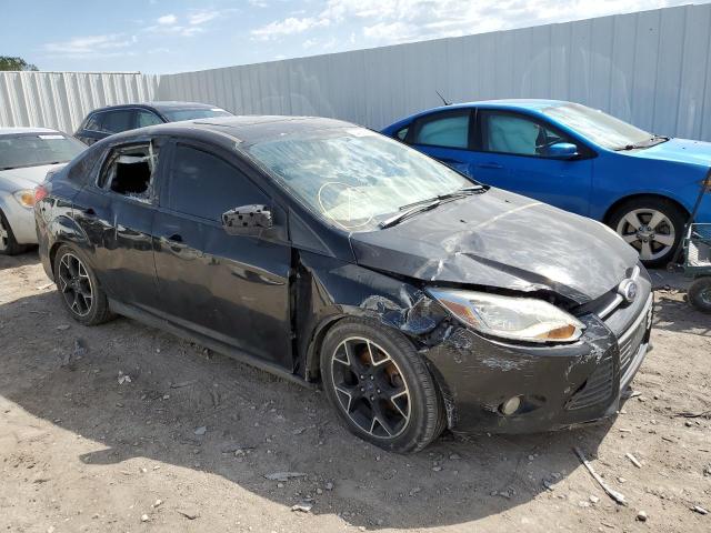 FORD FOCUS SE 2014 with VIN 1FADP3F24EL138076 - Photo from auction