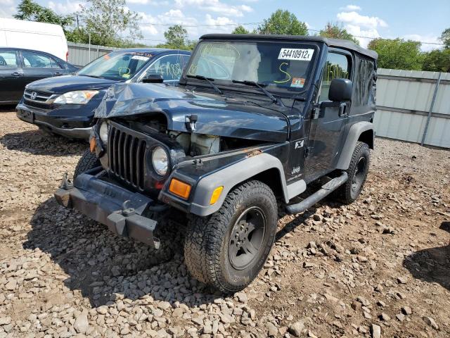 Photo 2 from auction – 2004 JEEP WRANGLER R with VIN 1J4FA39S24P703135