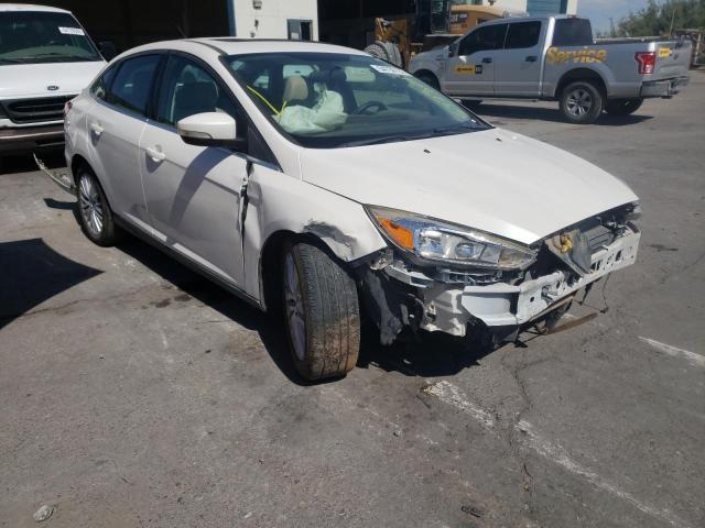 FORD FOCUS 2016 with VIN 1FADP3J2XGL229878 - Photo from auction