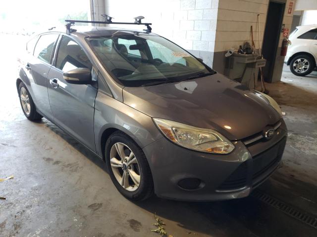 FORD FOCUS SE 2014 with VIN 1FADP3K22EL410775 - Photo from auction