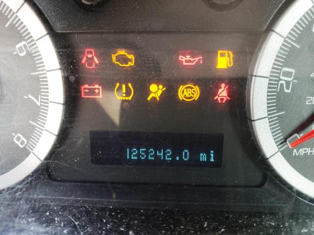 Photo 8 from auction – 2009 FORD ESCAPE LIM with VIN 1FMCU04G69KD01751