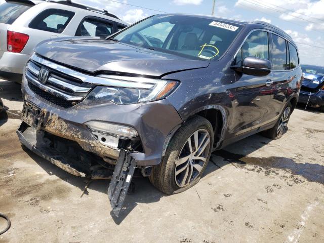 Photo 2 from auction – 2017 HONDA PILOT TOUR with VIN 5FNYF6H92HB046983