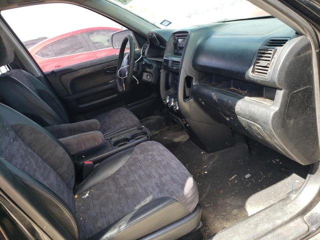 Photo 5 from auction – 2004 HONDA CR-V LX with VIN JHLRD68434C009627