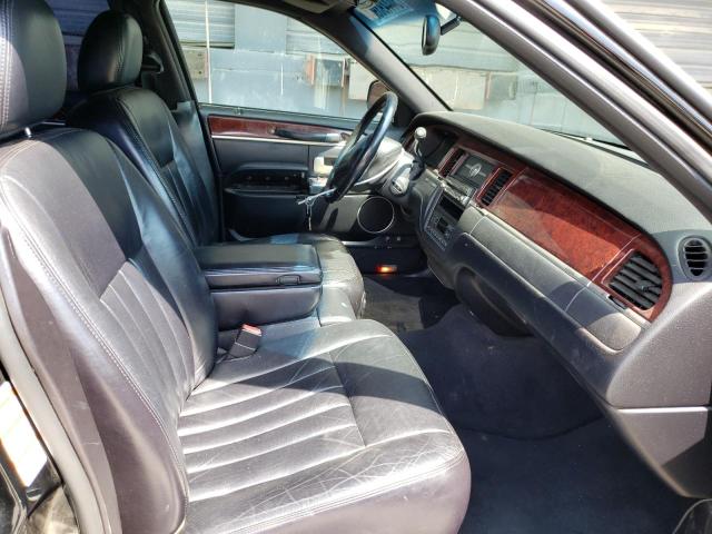 Photo 5 from auction – 2003 LINCOLN TOWN CAR E with VIN 1LNHM84W33Y664024