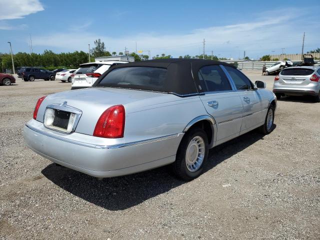 Photo 4 from auction – 2000 LINCOLN TOWN CAR E with VIN 1LNHM81W6YY856677