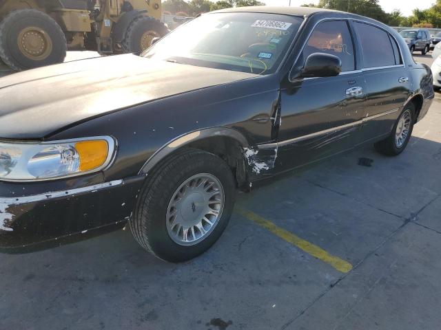 Photo 9 from auction – 2000 LINCOLN TOWN CAR E with VIN 1LNHM81W7YY843260