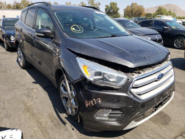 FORD ESCAPE TIT 2018 with VIN 1FMCU0J94JUA04556 - Photo from auction