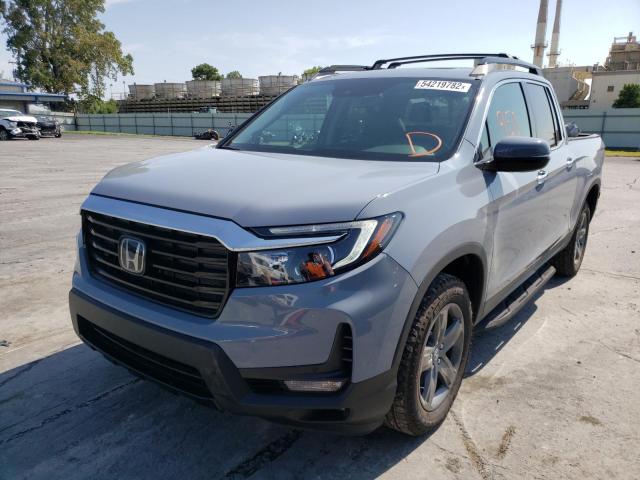 Photo 2 from auction – 2022 HONDA RIDGELINE with VIN 5FPYK3F70NB028769