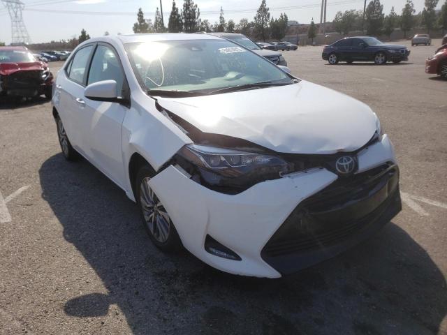 TOYOTA COROLLA L 2018 with VIN 5YFBURHE6JP751600 - Photo from auction