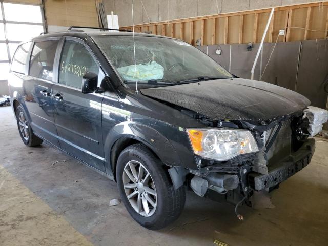 DODGE GRAND CARA 2015 with VIN 2C4RDGCG7FR660550 - Photo from auction