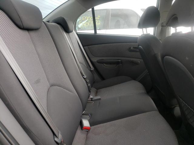 Photo 6 from auction – 2011 KIA RIO BASE with VIN KNADH4A30B6748285
