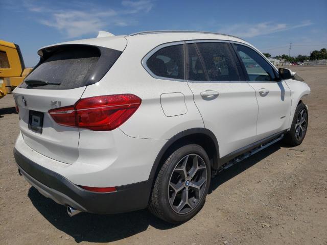 Photo 4 from auction – 2018 BMW X1 XDRIVE2 with VIN WBXHT3C33J5K32312