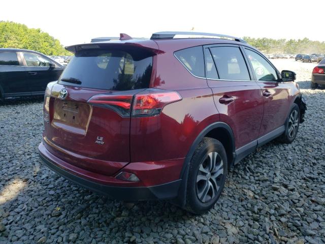 Photo 4 from auction – 2018 TOYOTA RAV4 LE with VIN JTMBFREV7JD253200