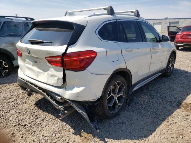 Photo 4 from auction – 2017 BMW X1 XDRIVE2 with VIN WBXHT3C33H5F79328