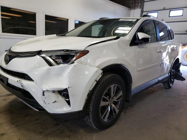 Photo 9 from auction – 2017 TOYOTA RAV4 XLE with VIN JTMRFREV8HJ110458