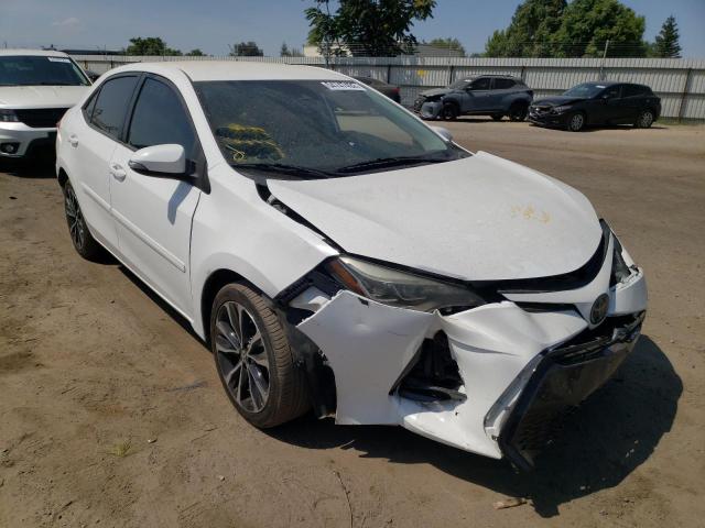 TOYOTA COROLLA L 2019 with VIN 5YFBURHEXKP870087 - Photo from auction