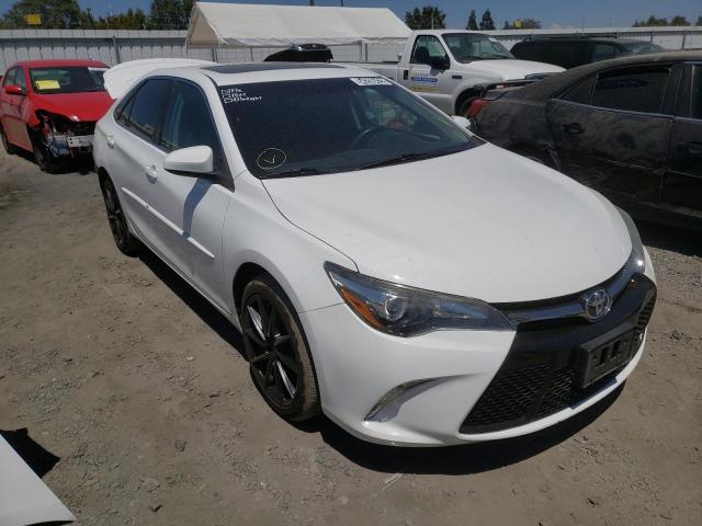TOYOTA CAMRY LE 2015 with VIN 4T1BF1FK0FU875369 - Photo from auction