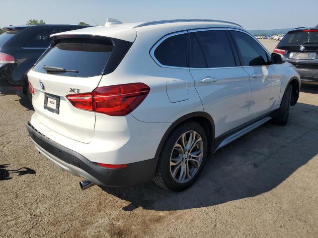 Photo 4 from auction – 2016 BMW X1 XDRIVE2 with VIN WBXHT3C34G5F66814