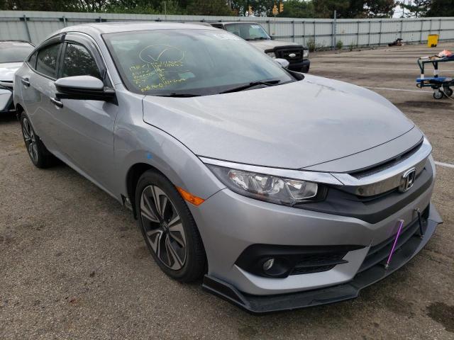 HONDA CIVIC EX 2017 with VIN 19XFC1F39HE002860 - Photo from auction