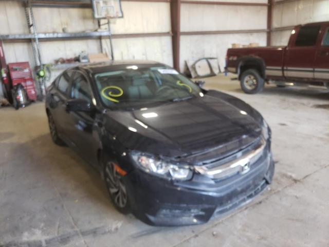 HONDA CIVIC EX 2018 with VIN 19XFC2F71JE017660 - Photo from auction
