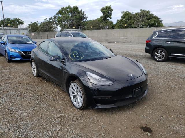 TESLA MODEL 3 2022 with VIN 5YJ3E1EB2NF143555 - Photo from auction