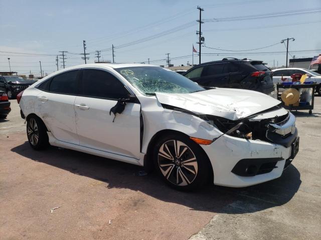 HONDA CIVIC EX 2018 with VIN JHMFC1F30JX006137 - Photo from auction