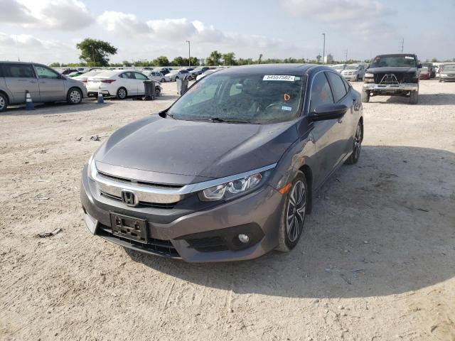 Photo 2 from auction – 2017 HONDA CIVIC EXL with VIN 2HGFC1F79HH633701