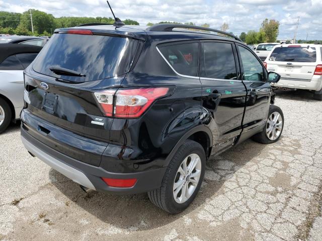 Photo 4 from auction – 2018 FORD ESCAPE SE with VIN 1FMCU0GD5JUB24913