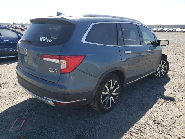 Photo 4 from auction – 2022 HONDA PILOT ELIT with VIN 5FNYF6H02NB029176