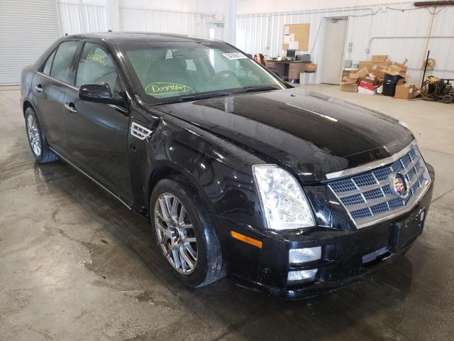 CADILLAC STS 2010 with VIN 1G6DU6EVXA0130272 - Photo from auction