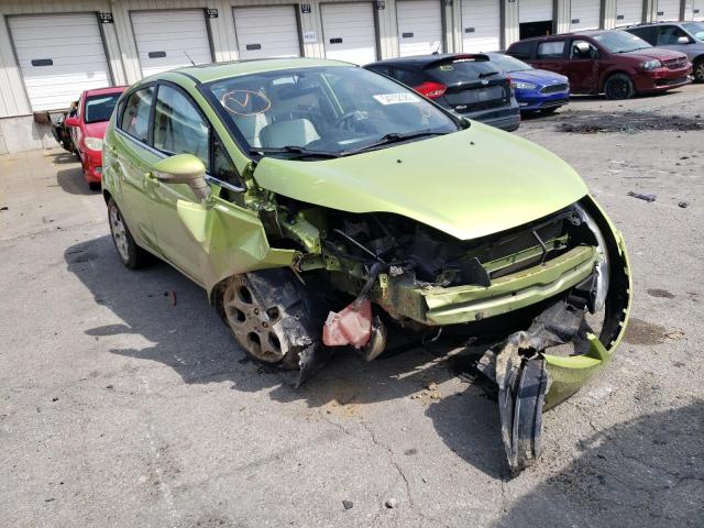 FORD FIESTA SES 2011 with VIN 3FADP4FJ2BM148130 - Photo from auction