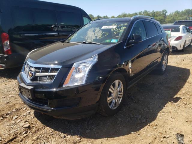 Photo 2 from auction – 2011 CADILLAC SRX LUXURY with VIN 3GYFNAEYXBS674940