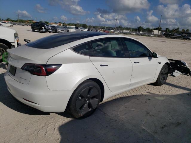 Photo 4 from auction – 2021 TESLA MODEL 3 with VIN 5YJ3E1EB8MF992958